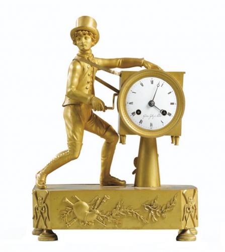 Gilt bronze clock depicting a barrel organ player