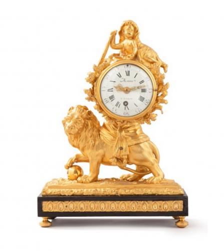 A late Louis XV style gilt bronze mantel clock