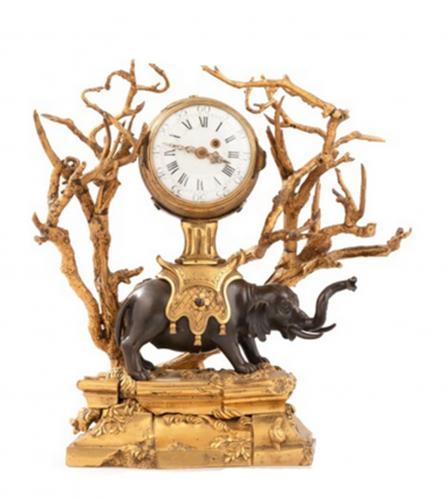 Louis XVI patinated and gilt bronze mantel clock