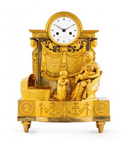 A Restauration "l'enfant du miracle" mantel clock