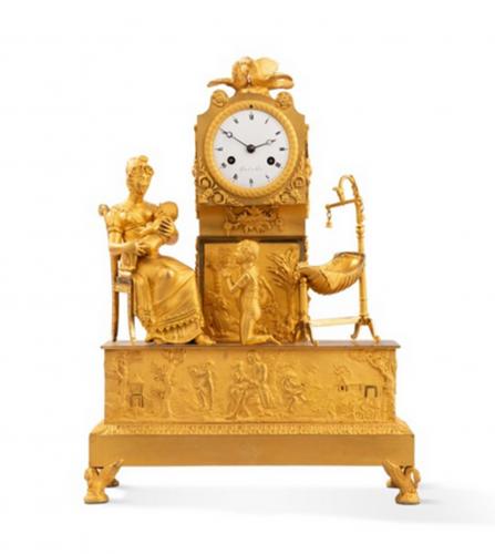 A French Restauration gilt bronze mantel clock