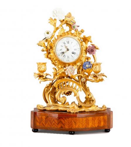 A Louis XV porcelain mantel clock