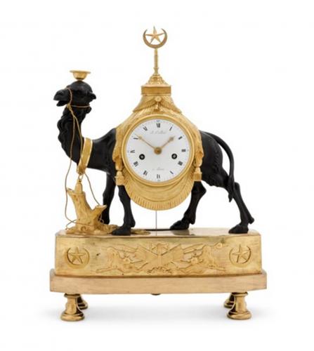 An Empire ormolu and patinated bronze camel clock