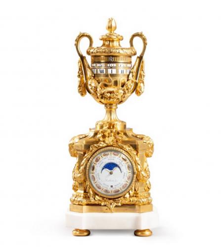 A Louis XVI striking and astronomical vase clock