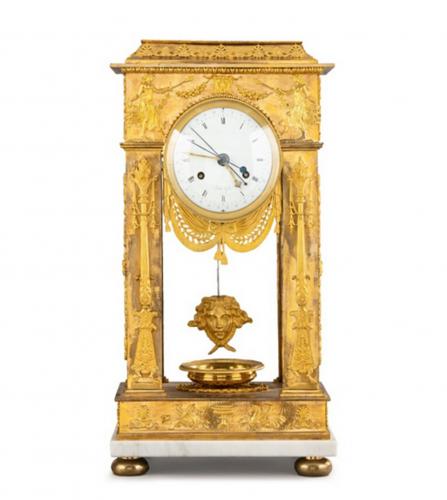 A gilt bronze regulator portico mantel clock