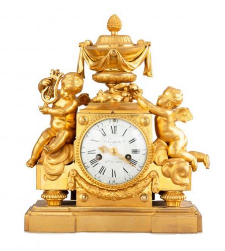 Louis XVI A gilt bronze mantel clock