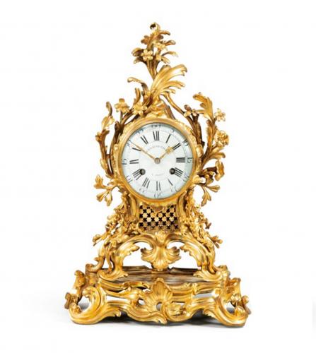 Louis XV A gilt bronze mantel clock