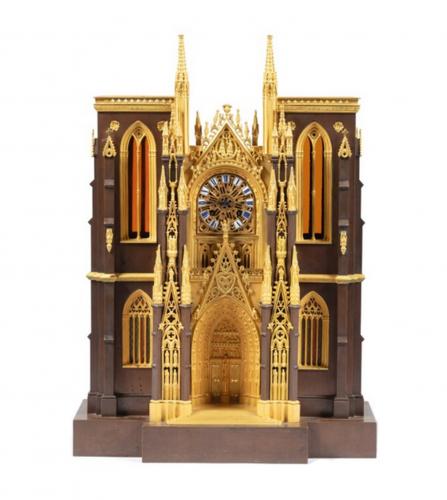 A patinated and gilt bronze cathedral clock