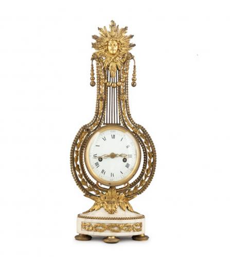 Louis XVI A gilt bronze and white marble lyraclock