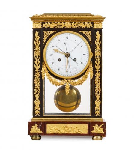 A Louis XVI gilt bronze complication clock