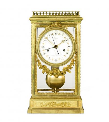 An Empire gilt bronze 'pendule à cage' clock