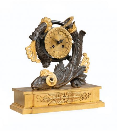 A RESTAURATION GILT BRONZE CLOCK