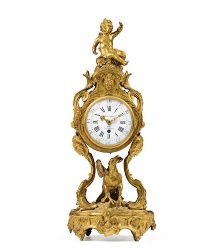 Louis XV period gilt bronze clock