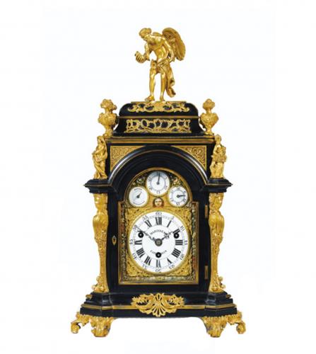 Blackened wood and gilt bronze clock