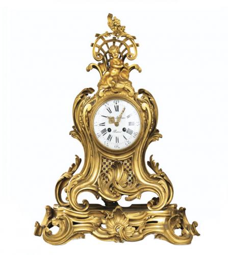 Louis XV style gilt bronze clock