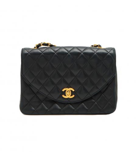 Sold at Auction: Vintage Chanel Quilted Black Leather Purse